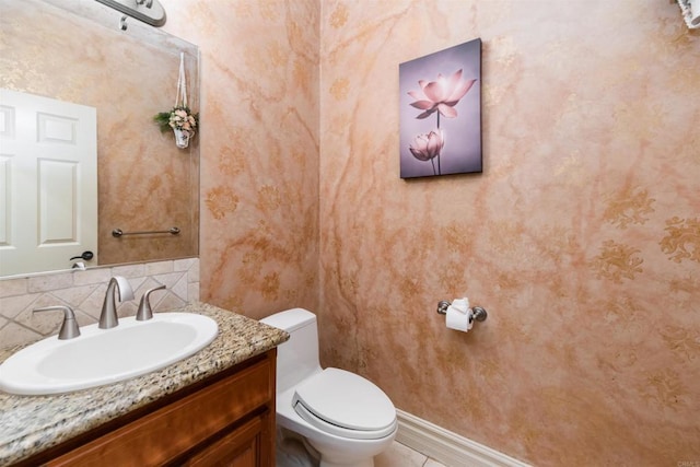 half bath with toilet and vanity