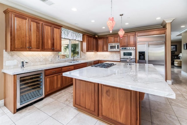 kitchen featuring visible vents, ornamental molding, light stone counters, wine cooler, and built in appliances