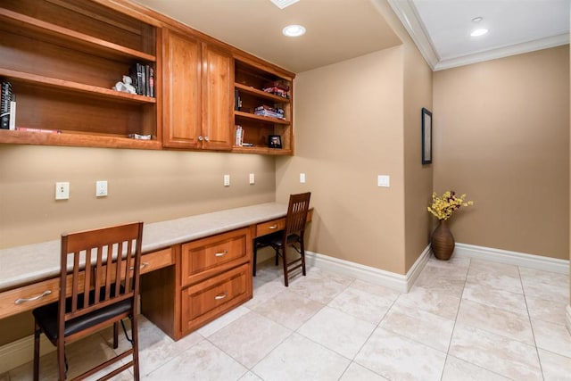 home office featuring recessed lighting, baseboards, built in desk, and ornamental molding