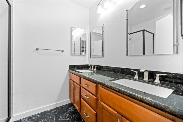 7201 Apricot Dr Unit 7201, Irvine, CA 92618 - full bathroom featuring a shower stall, double vanity, and marble look tile flooring