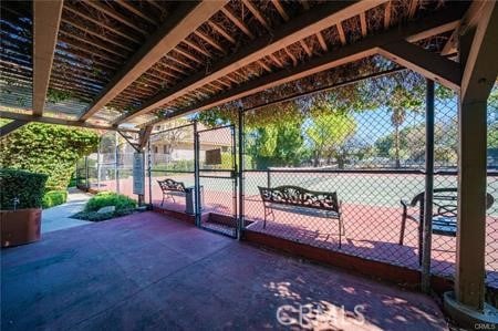 9000 Vanalden Ave Unit 155, Northridge, CA 91324 - view of patio / terrace featuring a gate and fence