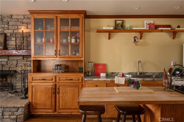29196 Lake Brook Ave, Cedar Glen, CA 92321 - bar with a sink and a stone fireplace