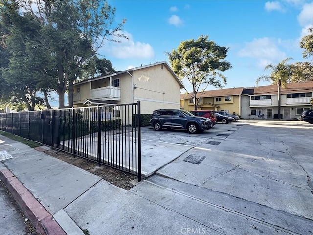 2414 Grove Ave, San Diego, CA 92154 - view of front of house featuring uncovered parking, stucco siding, and a residential view