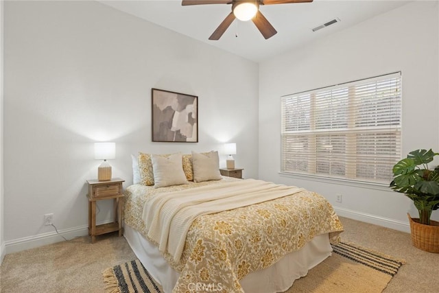 bedroom featuring visible vents, carpet flooring, a ceiling fan, and baseboards