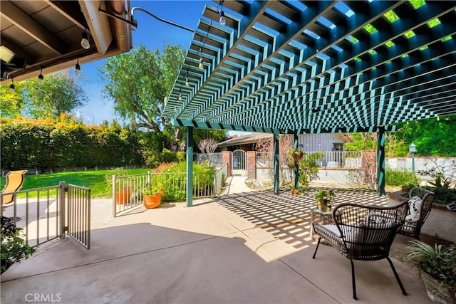 view of patio / terrace with fence and a pergola