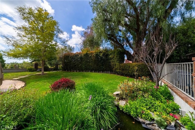 view of yard with fence
