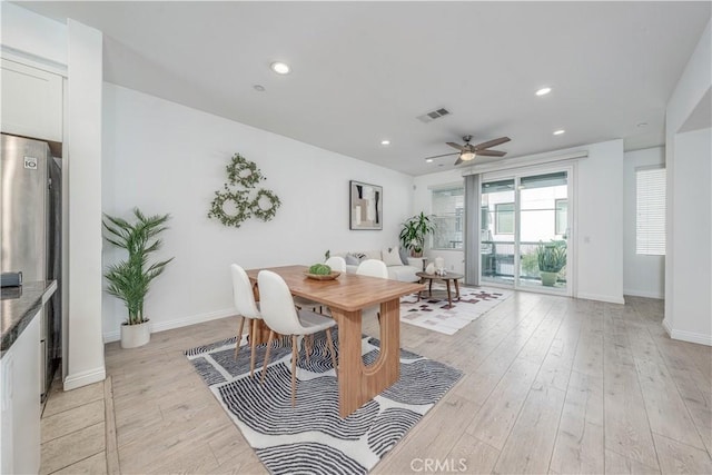 dining room with ceiling fan, light wood-type flooring, recessed lighting, and baseboards