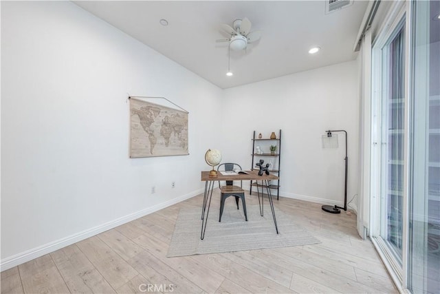 office with light wood-style flooring, ceiling fan, baseboards, and recessed lighting