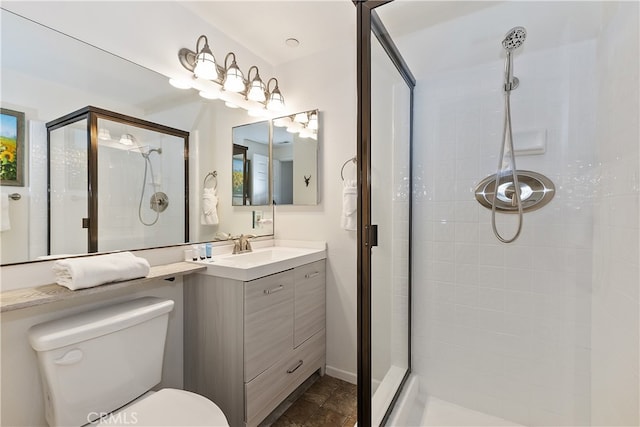 39802 Lakeview Dr Unit 26, Big Bear Lake, CA 92315 - bathroom featuring a stall shower, toilet, and vanity