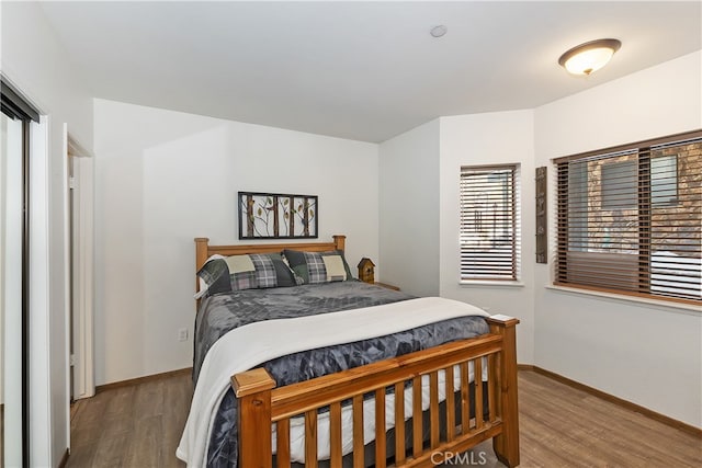 39802 Lakeview Dr Unit 26, Big Bear Lake, CA 92315 - bedroom featuring baseboards and wood finished floors