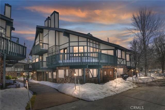 39802 Lakeview Dr Unit 26, Big Bear Lake, CA 92315 - rear view of house featuring stone siding and stucco siding