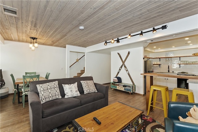 39802 Lakeview Dr Unit 26, Big Bear Lake, CA 92315 - living area with stairway, wood ceiling, wood finished floors, and visible vents