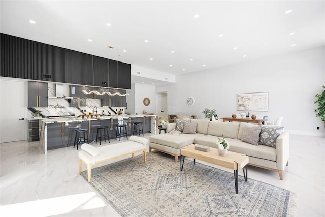 18802 Saginaw Dr, Irvine, CA 92603 - living room with recessed lighting and light marble finish floors
