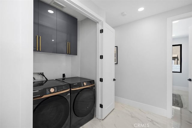 18802 Saginaw Dr, Irvine, CA 92603 - washroom with washing machine and dryer, light marble finish flooring, baseboards, recessed lighting, and cabinet space