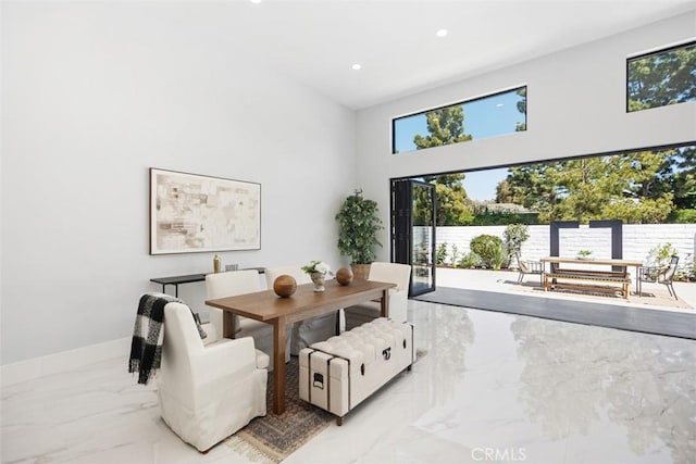 18802 Saginaw Dr, Irvine, CA 92603 - dining room featuring marble tiled floors, a towering ceiling, recessed lighting, and baseboards