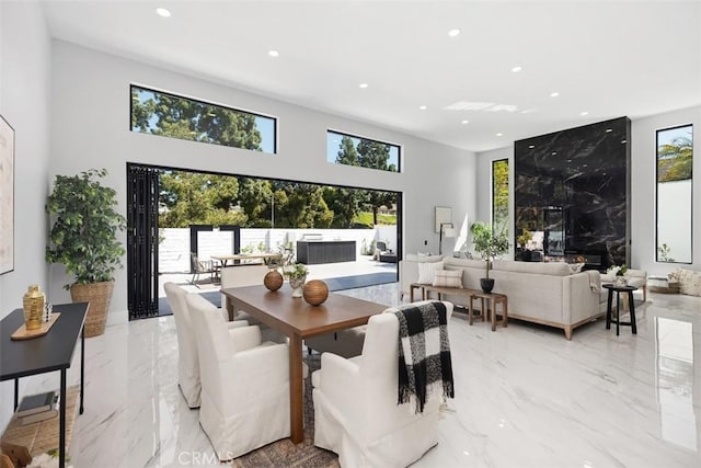18802 Saginaw Dr, Irvine, CA 92603 - dining room featuring light marble finish flooring, recessed lighting, and a towering ceiling