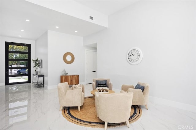 18802 Saginaw Dr, Irvine, CA 92603 - living room with marble tiled floors, recessed lighting, and baseboards