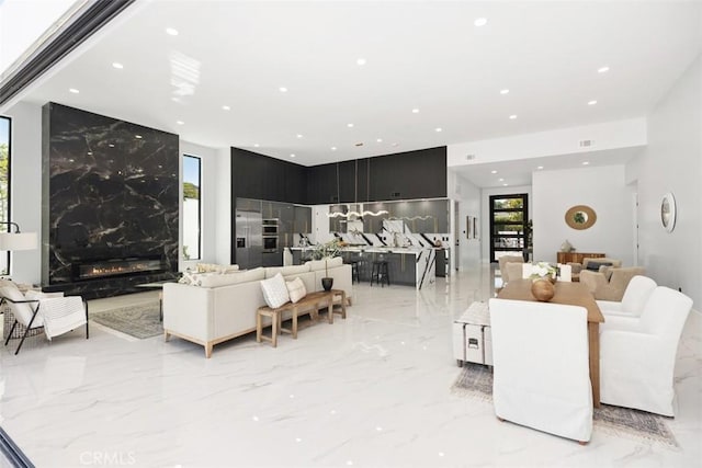 18802 Saginaw Dr, Irvine, CA 92603 - living area with light marble finish flooring and recessed lighting