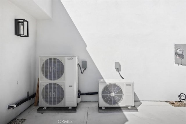 18802 Saginaw Dr, Irvine, CA 92603 - exterior view of ac unit, stucco siding, and electric meter