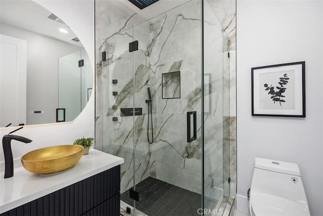 18802 Saginaw Dr, Irvine, CA 92603 - bathroom featuring toilet, vanity, and a marble finish shower