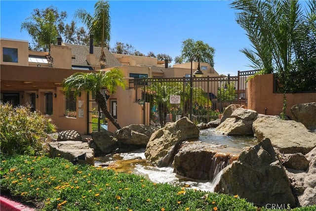 25712 Le Parc Unit 21, Lake Forest, CA 92630 - view of community featuring a garden pond