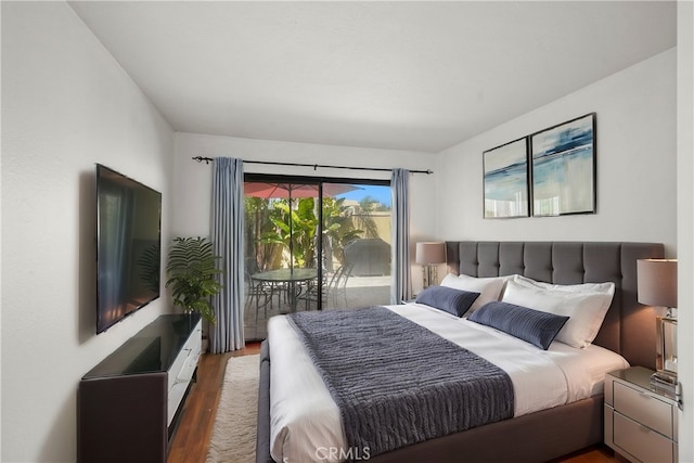 25712 Le Parc Unit 21, Lake Forest, CA 92630 - bedroom with wood finished floors and access to outside