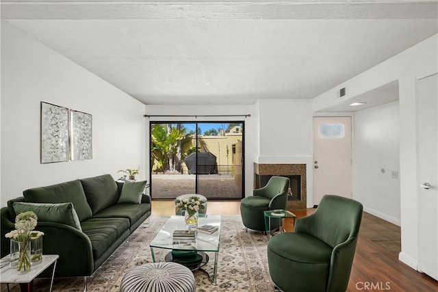 25712 Le Parc Unit 21, Lake Forest, CA 92630 - living area featuring a fireplace and wood finished floors