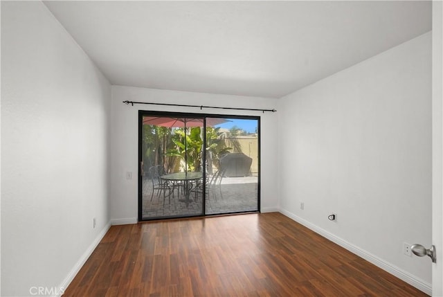 25712 Le Parc Unit 21, Lake Forest, CA 92630 - spare room with baseboards and wood finished floors