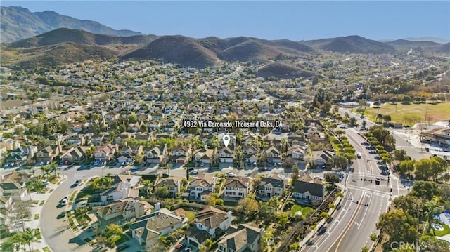 aerial view with a residential view and a mountain view