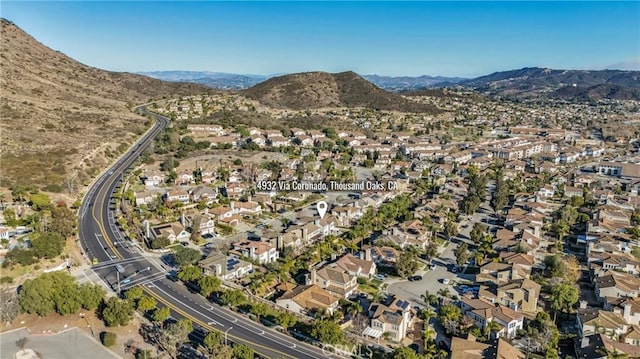 birds eye view of property featuring a residential view and a mountain view