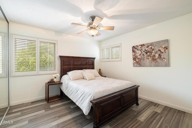 12084 London Grove Ct, Moorpark, CA 93021 - bedroom featuring wood finished floors, baseboards, and ceiling fan
