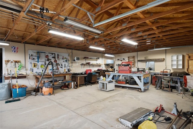 garage featuring a workshop area