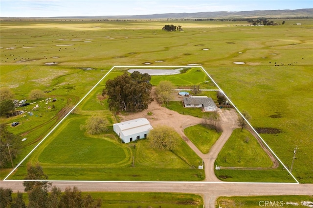 aerial view featuring a mountain view and a rural view