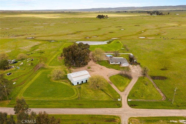 aerial view featuring a mountain view and a rural view