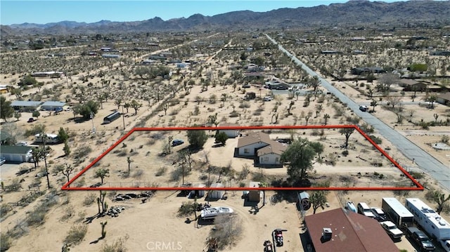 6613 Sunnyhill Rd, Joshua Tree, CA 92252 - bird's eye view featuring a rural view, view of desert, and a mountain view