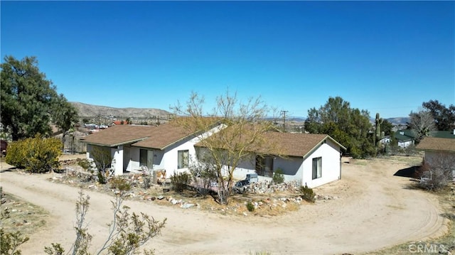 6613 Sunnyhill Rd, Joshua Tree, CA 92252 - view of front of property featuring stucco siding