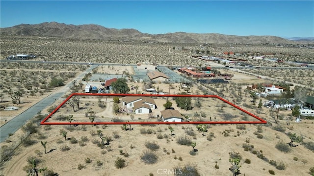 6613 Sunnyhill Rd, Joshua Tree, CA 92252 - drone / aerial view featuring a rural view, a desert view, and a mountain view