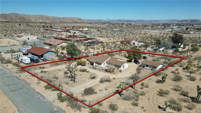 6613 Sunnyhill Rd, Joshua Tree, CA 92252 - drone / aerial view featuring a mountain view and view of desert