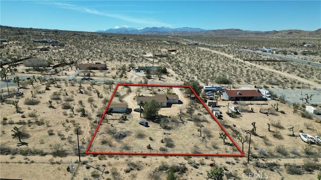 6613 Sunnyhill Rd, Joshua Tree, CA 92252 - drone / aerial view featuring view of desert, a rural view, and a mountain view