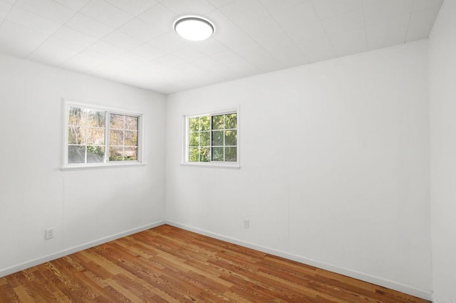 13954 Hazel Dr, Lytle Creek, CA 92358 - spare room with wood finished floors and baseboards