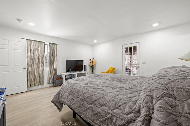 730 E 89th St, Los Angeles, CA 90002 - bedroom featuring multiple windows, recessed lighting, and light wood finished floors