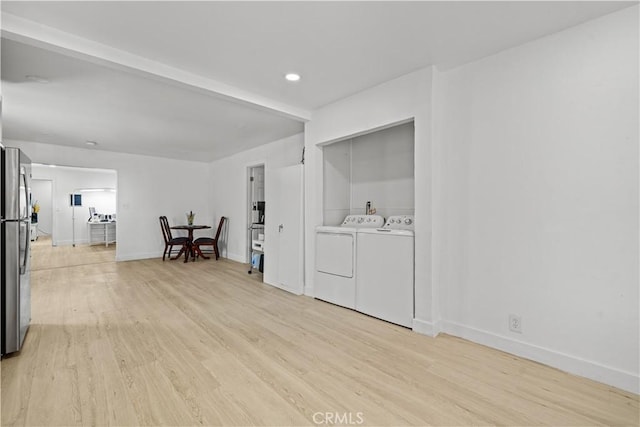 730 E 89th St, Los Angeles, CA 90002 - clothes washing area with washing machine and dryer, recessed lighting, light wood-style floors, baseboards, and laundry area