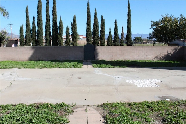 17730 Ivy Ave, Fontana, CA 92335 - view of patio / terrace with a gate and fence