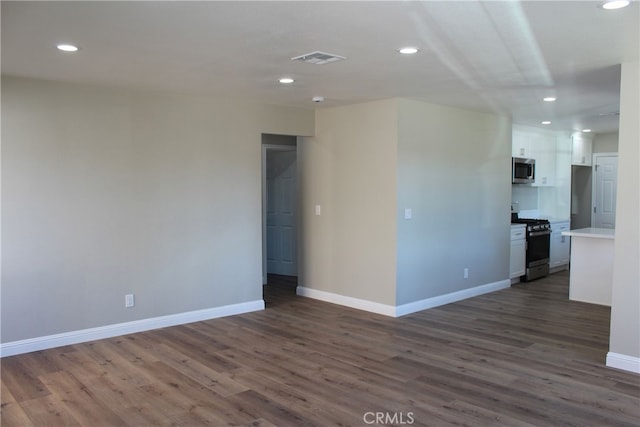 17730 Ivy Ave, Fontana, CA 92335 - unfurnished room featuring visible vents, recessed lighting, dark wood-style floors, and baseboards