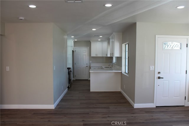 17730 Ivy Ave, Fontana, CA 92335 - kitchen with recessed lighting, white cabinets, and light countertops