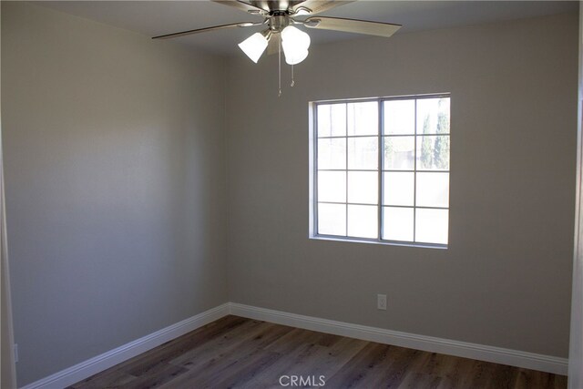 17730 Ivy Ave, Fontana, CA 92335 - spare room with a ceiling fan, wood finished floors, and baseboards