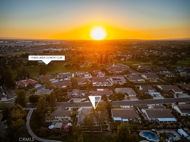 birds eye view of property with a residential view