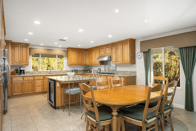 dining room with recessed lighting, wine cooler, light tile patterned flooring, and visible vents