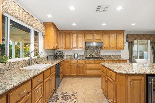 kitchen with visible vents, wine cooler, light stone counters, a sink, and dishwasher