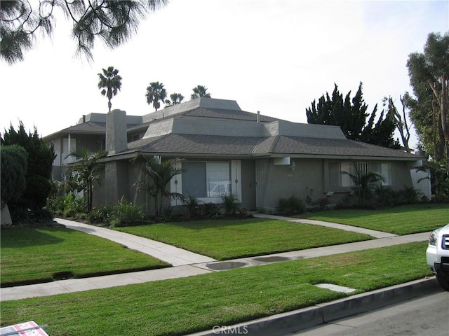 414 Nobel Ave Unit D, Santa Ana, CA 92707 - view of front of home featuring a front lawn and stucco siding